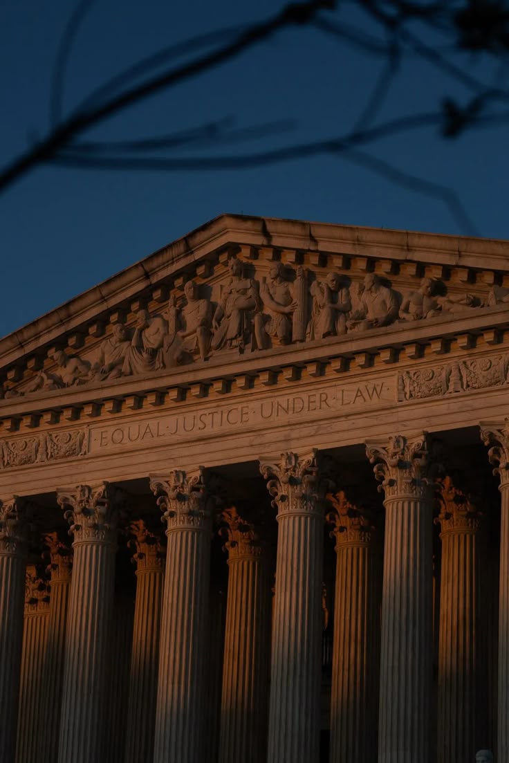 Courthouse pillars engraved Equal Justice Under Law