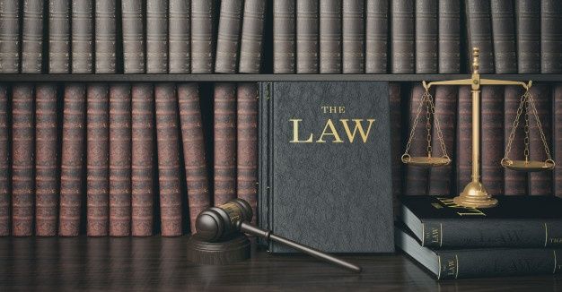 Law library with scales of justice